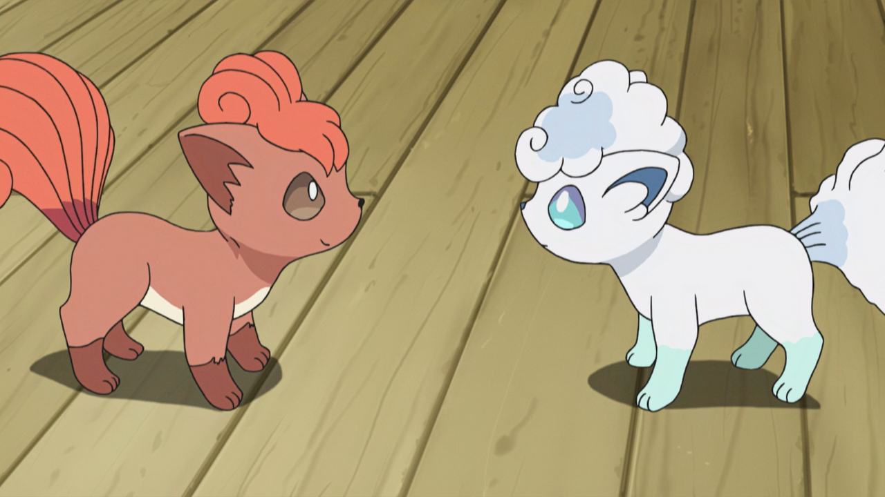 Pokemon anime screenshot of Kantonian Vulpix and Alolan Vulpix facing each other.