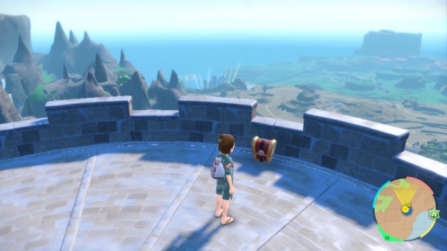 Player character standing in front of a Gimmighoul Chest on top of a watchtower in Pokemon Scarlet.