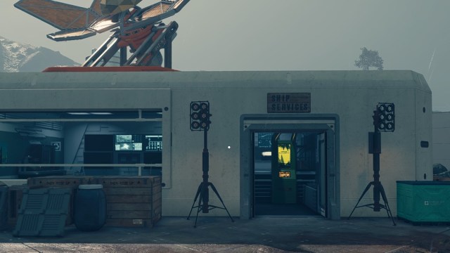 Starfield screenshot of the long white Eleos Retreat Ship Services building with flood lights on other side of the door and a satellite antenna on the roof.