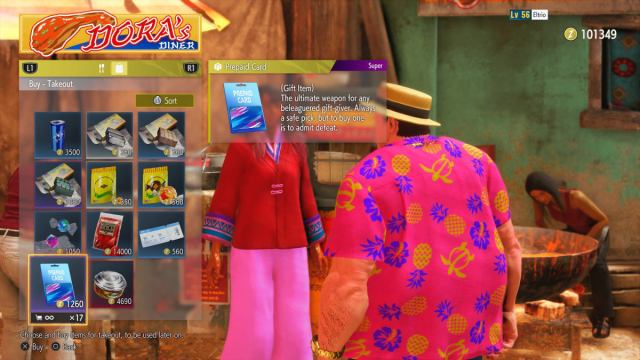 A Street Fighter 6 World Tour mode screenshot of the player browsing Dora's Diner's wares. The Prepaid Card item is highlighted.