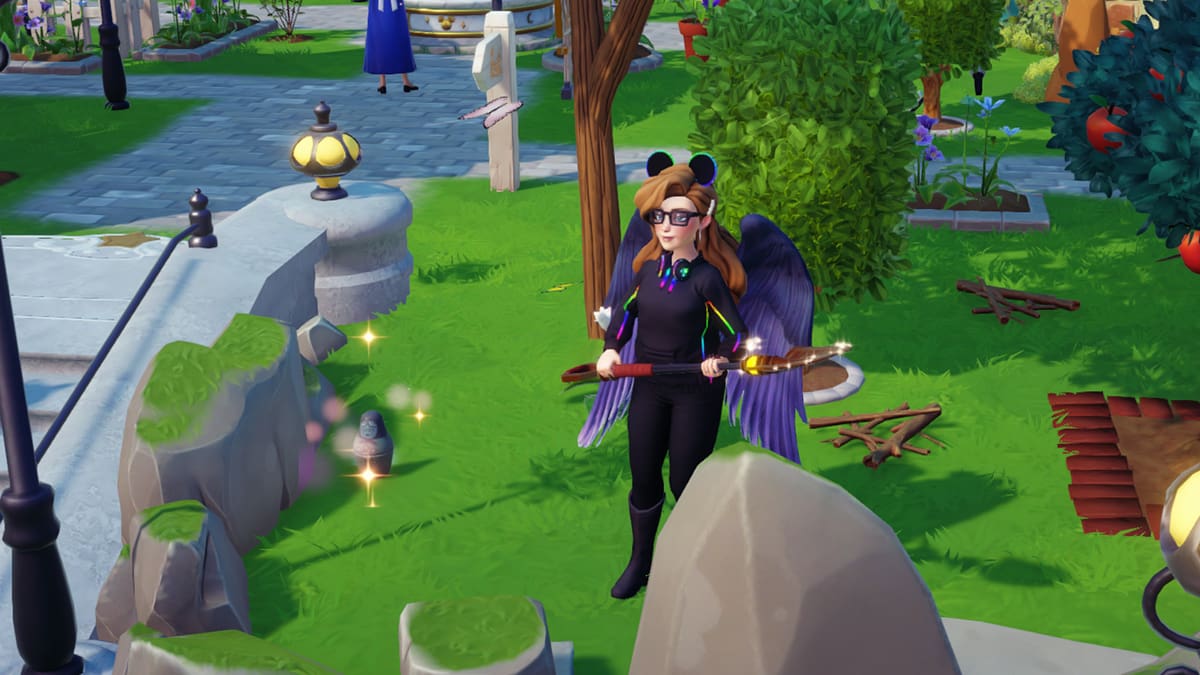 Disney Dreamlight Valley screenshot of player character wearing black wings and holding a shovel next to a Matryoshka Doll